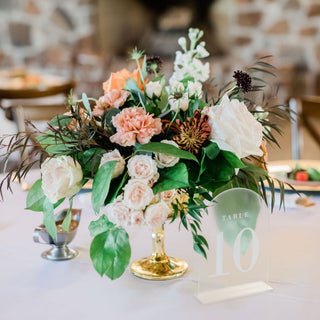 A closeup shot of a floral wedding centerpiece.