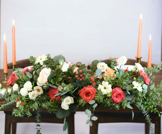 Floral decor on couple's table.